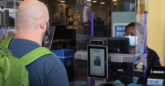 A tablet capture the traveller’s photo to immediately verify that his face matches that on his ID